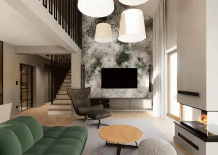 Wnętrze salonu z zieloną sofą i kominkiem w stylu industrialnym.