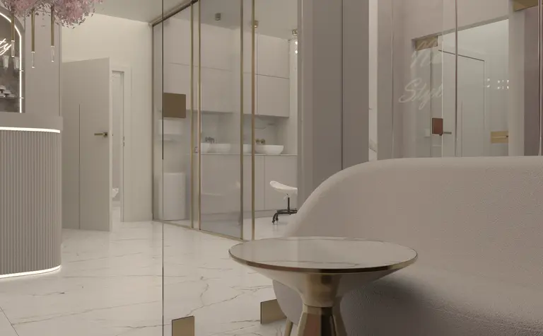 Nowoczesne wnętrze glamour z jasnymi meblami i złotymi detalami.