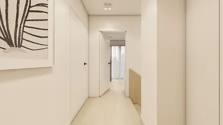 Przedpokój w stylu japandi i minimalistycznym z jasnymi ścianami i drewnianą podłogą.