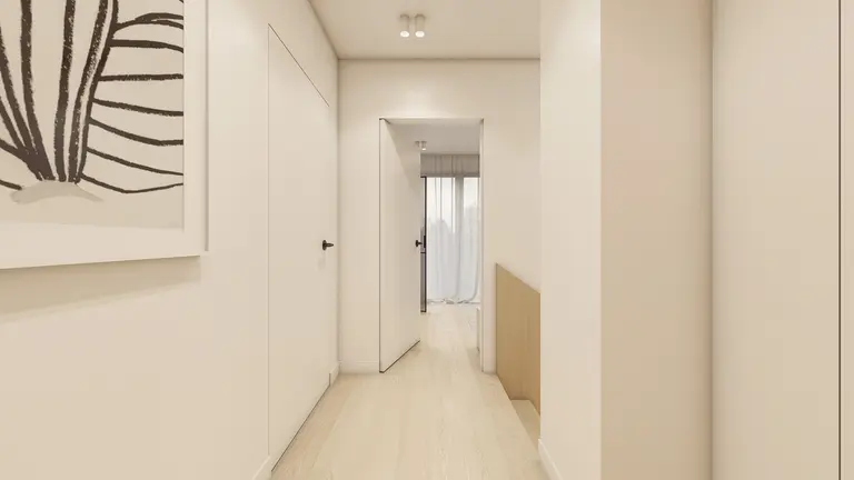 Przedpokój w stylu japandi i minimalistycznym z jasnymi ścianami i drewnianą podłogą.