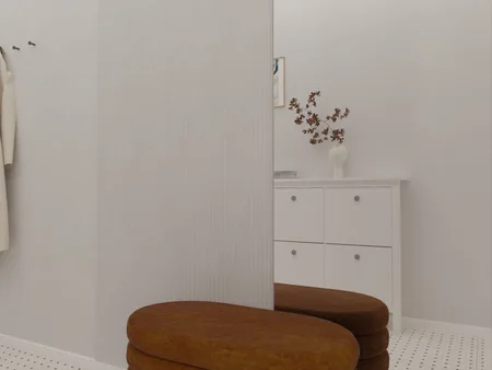 Minimalistyczne wnętrze z brązowymi siedziskami i białą komodą, styl vintage i współczesny.