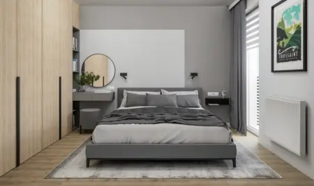 Sypialnia w stylu minimalistycznym z nowoczesnymi meblami i delikatnymi akcentami.