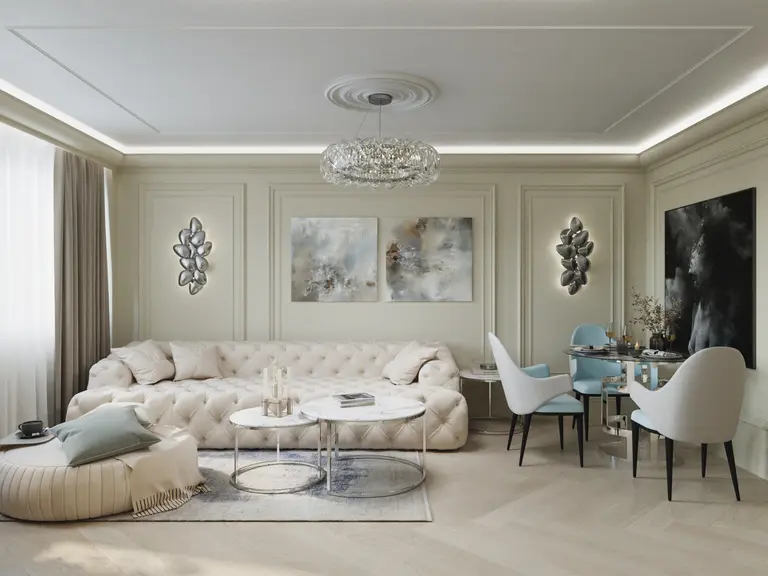 Nowoczesny salon w stylu glamour z jasnymi meblami i dekoracjami.