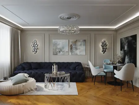 Stylowe wnętrze salonu w stylu glamour z niebieską kanapą oraz drewnianym stołem.