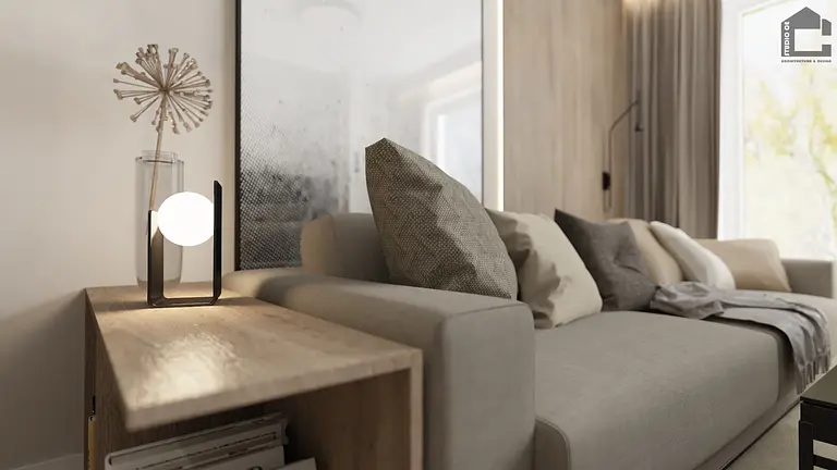 Wnętrze salonu z minimalistyczną sofą i lampą w stylu industrialnym.