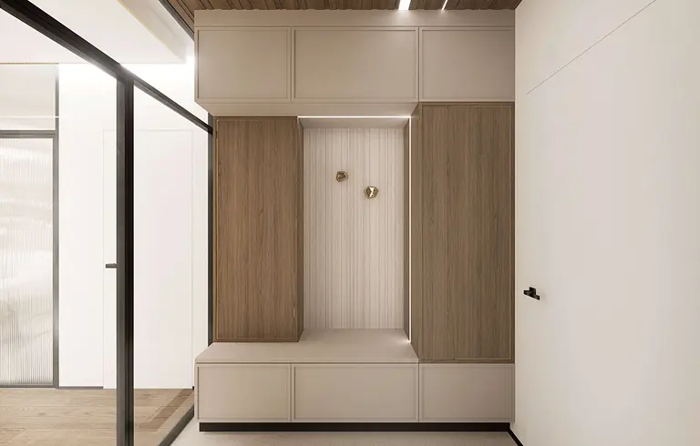 Minimalistyczny przedpokój z drewnianymi szafkami i jasnym tłem, nowoczesny design.