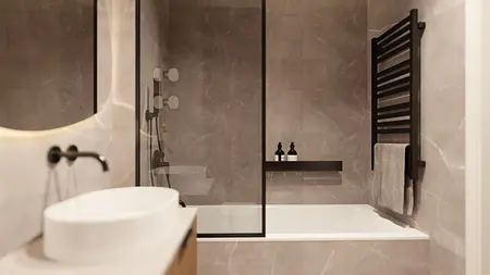 Nowoczesna łazienka z wanną, umywalką i akcentami glamour oraz minimalistycznym designem.