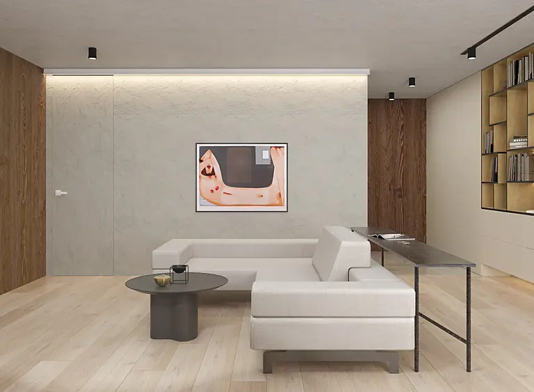 Wnętrze salonu w stylu japandi z minimalistycznymi meblami i drewnianymi detalami.