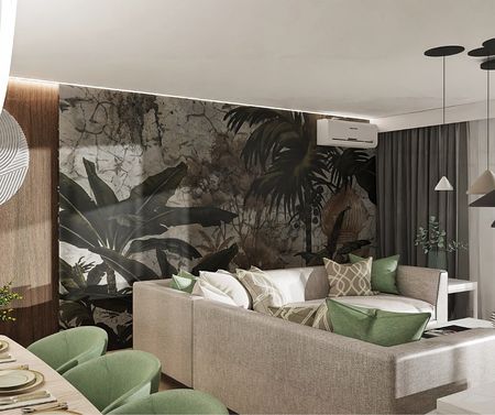 Nowoczesny salon z zielonymi dodatkami i roślinami dekoracyjnymi.