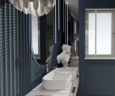 Nowoczesna łazienka w stylu art deco z niebieskimi ścianami i białą ceramiką.