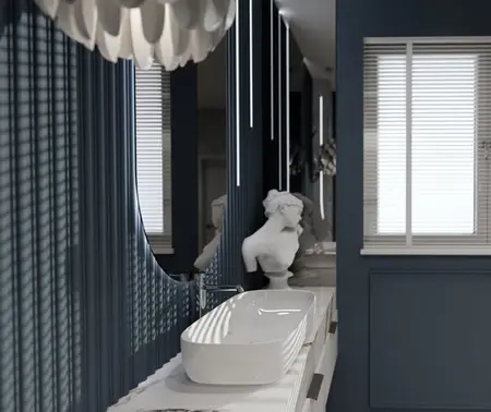 Nowoczesna łazienka w stylu art deco z niebieskimi ścianami i białą ceramiką.