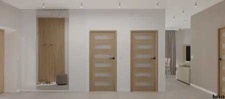 Przedpokój w stylu japandi z minimalistycznymi elementami i nowoczesnymi drzwiami.