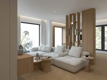 Wnętrze salonu w stylu japandi i minimalistycznym z jasnymi meblami.