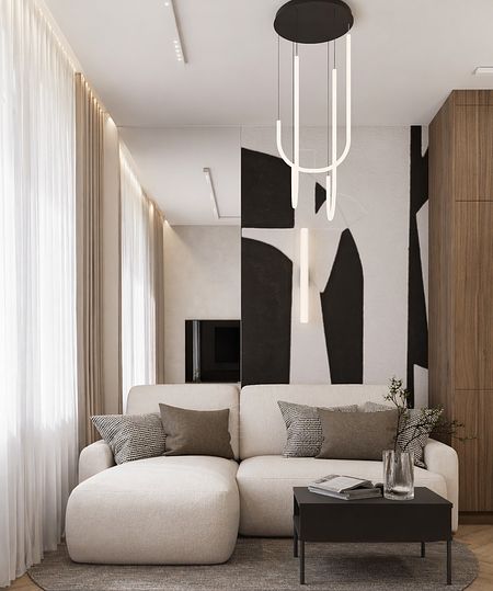 Nowoczesny salon w stylu quiet luxury i japandi z jasną sofą i drewnianymi elementami.