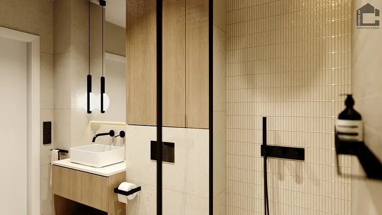 Nowoczesna łazienka z minimalistycznym wystrojem, drewnianymi meblami i eleganckimi akcesoriami.