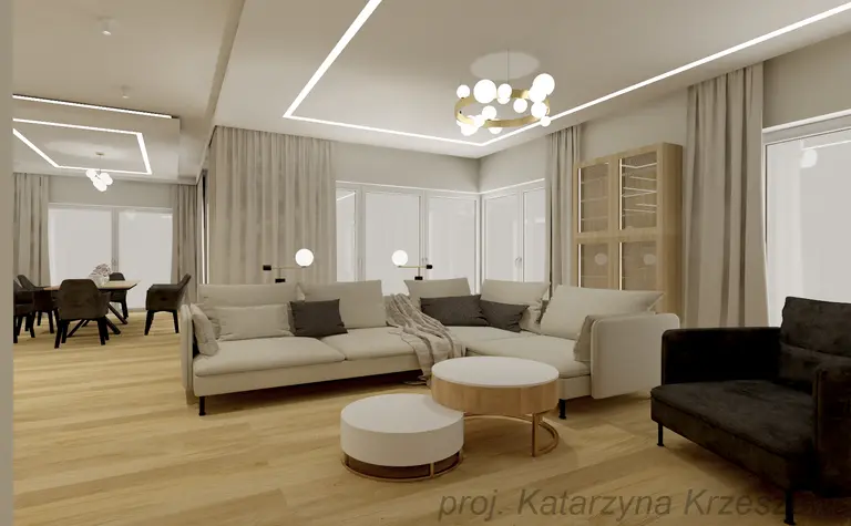Nowoczesny salon z jasnymi meblami, drewnianą podłogą i dużymi oknami.