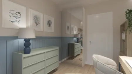 Wnętrze pokoju z zieloną komodą, niebieską lampą oraz obrazami w stylu boho, minimalistycznym i nowoczesnym.