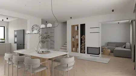 Wnętrze minimalistycznej kuchni z drewnianym stołem i szarymi meblami.