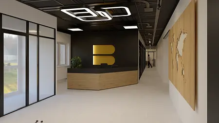 Wnętrze biura z recepcją, drewnianym biurkiem i industrialnym stylem.