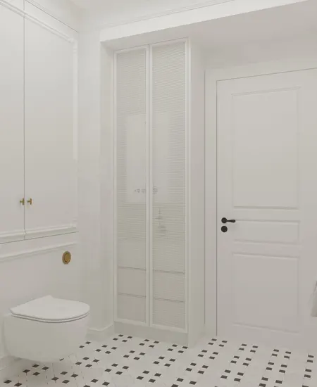 Wnętrze łazienki z białymi meblami, podłogą art deco oraz tradycyjnymi detalami.
