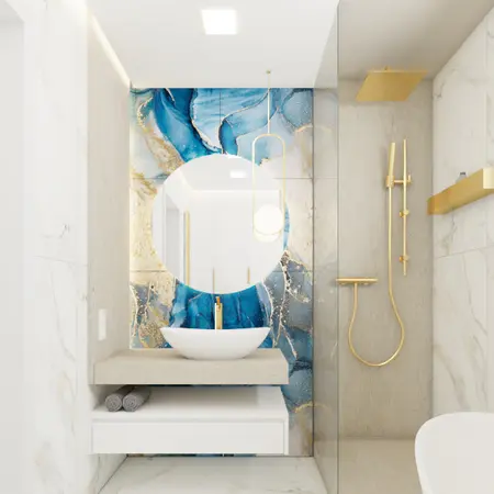 Nowoczesna łazienka z niebieskimi kafelkami i złotymi elementami, styl glamour i quiet luxury.