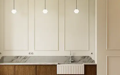 Kuchnia w stylu art deco z drewnianymi meblami, marmurowym blatem, minimalistycznym oświetleniem.