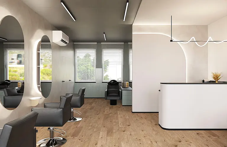 Wnętrze salonu fryzjerskiego w stylu boho i japandi, z drewnianą podłogą i nowoczesnymi lustrami.