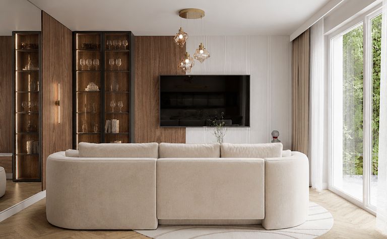 Wnętrze nowoczesnego salonu quiet luxury z jasną sofą i drewnianymi detalami.