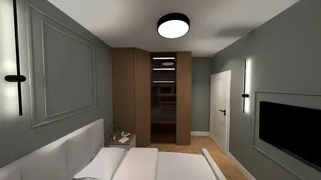 Współczesna sypialnia z szarymi ścianami i drewnianymi detalami.