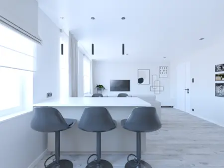 Wnętrze jadalni w stylu industrialnym, minimalistycznym i współczesnym z białym stołem.