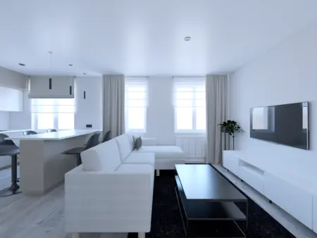 Nowoczesne wnętrze salonu w stylu industrialnym i minimalistycznym z białymi meblami.