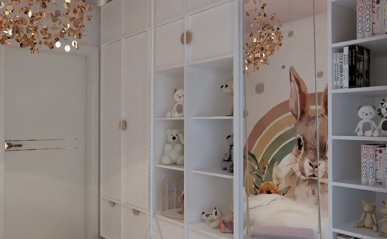 Pokój dziecięcy z białymi meblami, złotymi akcentami i dekoracjami w stylu glamour i nowoczesnym.