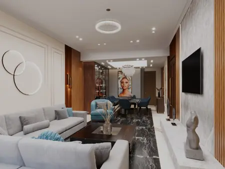 Nowoczesny salon z szarymi meblami, drewnianymi detalami i eleganckimi dekoracjami.