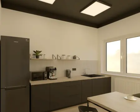 Kuchnia w stylu industrialnym z czarnymi meblami i drewnianym blatem.