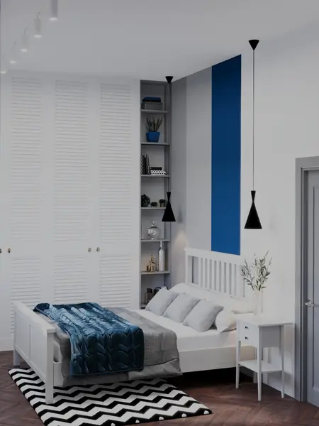 Sypialnia z niebieską ścianą i białymi meblami, nowoczesny design.