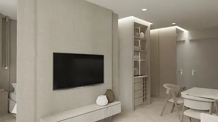 Wnętrze w stylu soft minimalizm z telewizorem, jasnymi meblami i drewnianymi detalami.