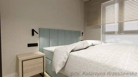 Sypialnia z niebieskim wezgłowiem, drewnianą szafką, industrialne, minimalistyczne, współczesne.