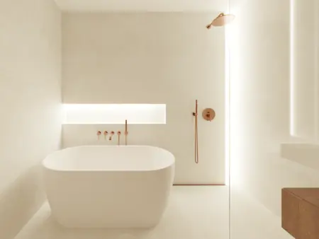 Nowoczesna łazienka z minimalistycznym designem, wanną i oświetleniem LED.