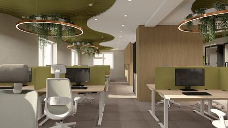 Wnętrze biura w stylu industrialnym i minimalistycznym z zielonymi dodatkami.