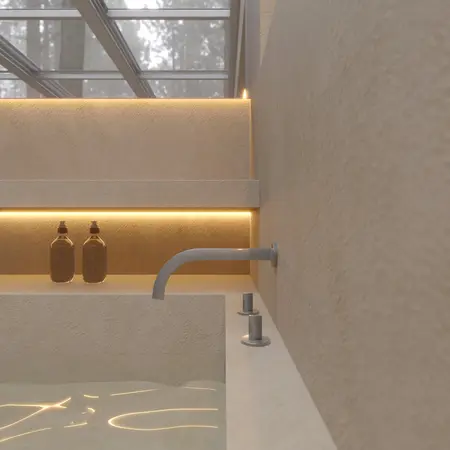 Wnętrze łazienki z podświetlaną umywalką w stylu soft minimalizm.