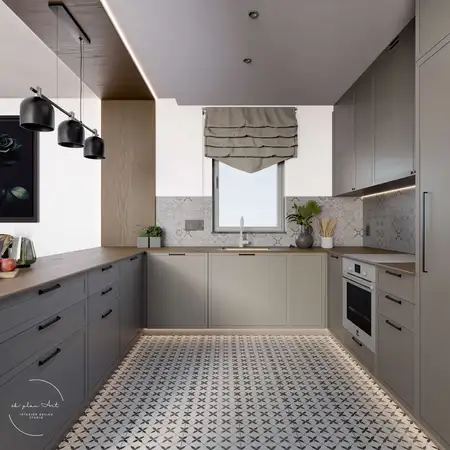 Nowoczesna kuchnia w stylu minimalistycznym z szarymi meblami i drewnianym blatem.