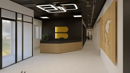 Wnętrze biura z recepcją, drewnianym biurkiem i industrialnym stylem.