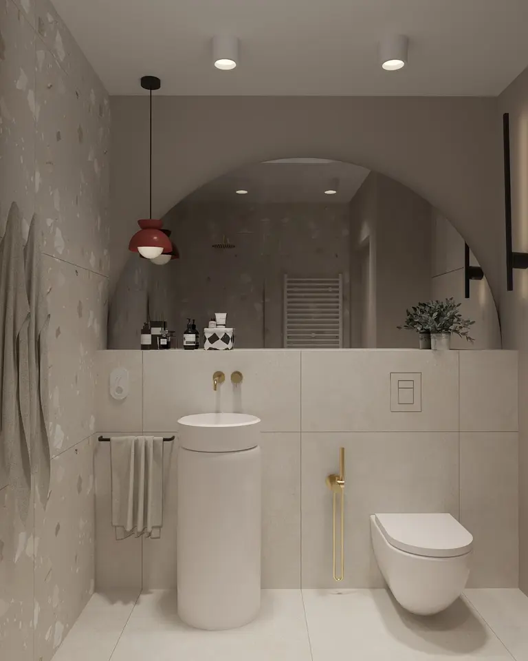 Nowoczesna łazienka z białą ceramiką i złotymi detalami