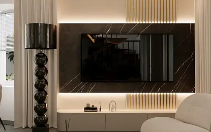 Nowoczesne wnętrze salonu z telewizorem, lampą i jasnymi meblami w stylu minimaluxe.