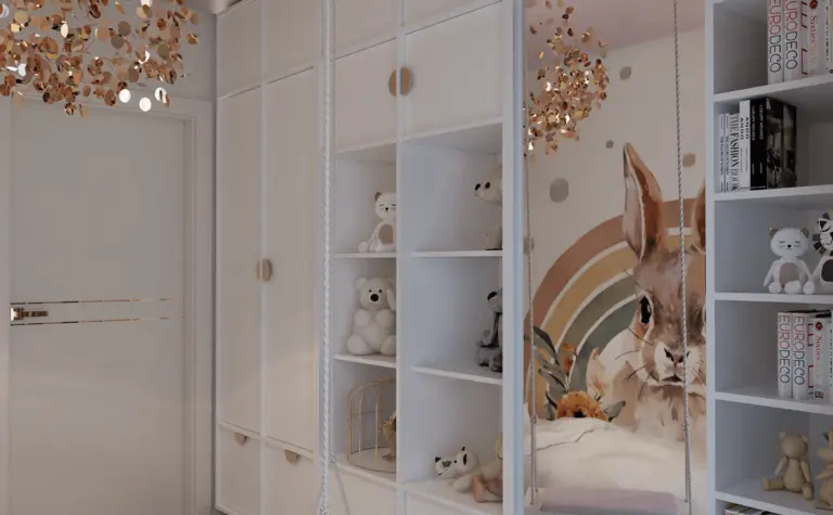 Pokój dziecięcy z białymi meblami, złotymi akcentami i dekoracjami w stylu glamour i nowoczesnym.