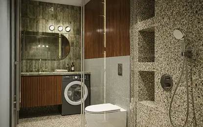 Wnętrze łazienki z drewnianymi meblami, zielonymi kaflami, industrialnym i vintage style.