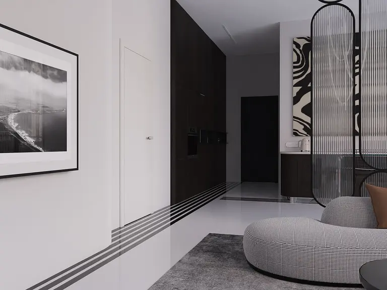 Wnętrze z elementami art deco i minimalistycznymi, z szarym dywanem i czarnymi meblami.