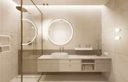 Nowoczesna łazienka z minimalistycznym designem, białymi meblami i okrągłym lustrem