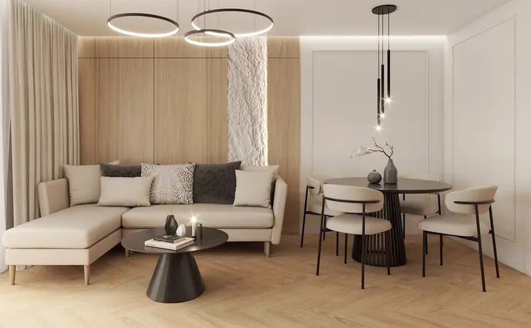 Wnętrze salonu z nowoczesnymi i tradycyjnymi akcentami, beżowa sofa i drewniane elementy.
