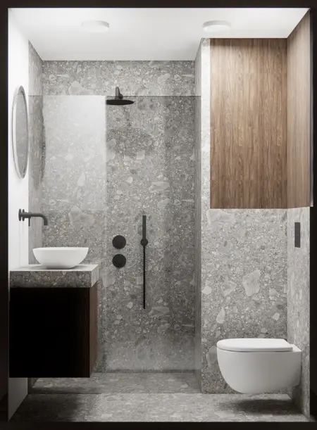 Nowoczesna łazienka z szarym wykończeniem kamiennym i drewnianymi elementami, minimalistyczny design.